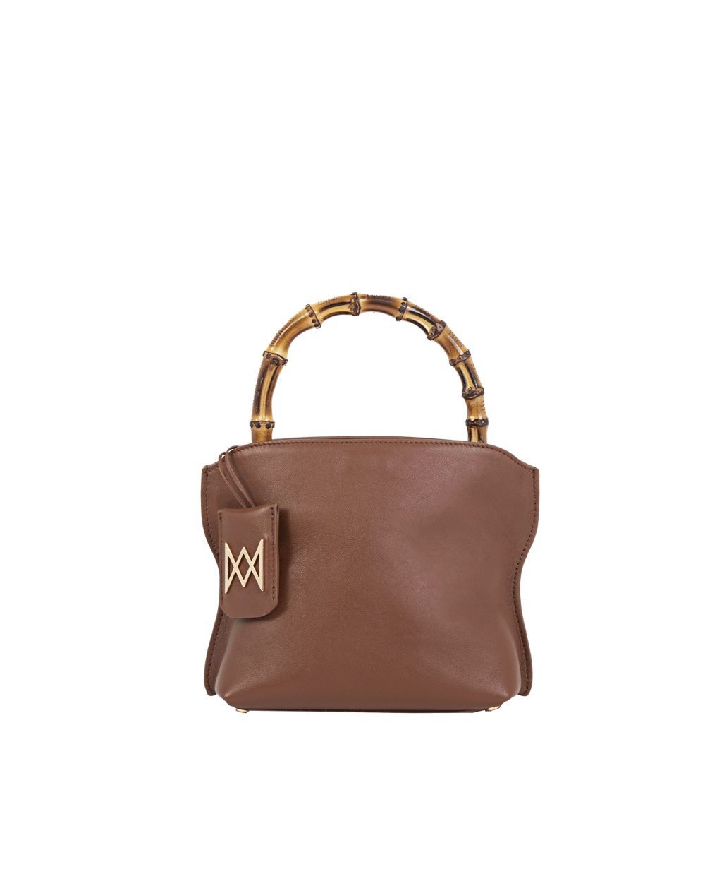 Cross-body bag in calf leather with detachable shoulder strap. Bamboo handles. Made In Italy. Two compartments, zip pocket in the back compartment. Magnetic flap closure with logo. Color: Mocha. Size: Medium 