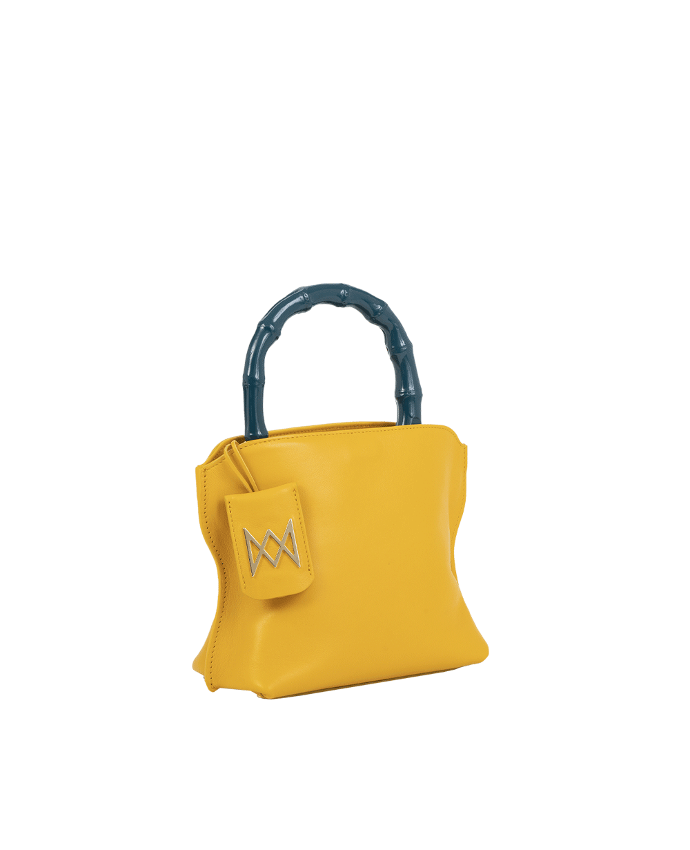 Cross-body bag in calf leather with detachable shoulder strap. Bamboo handles. Made In Italy. Two compartments, zip pocket in the back compartment. Magnetic flap closure with logo. Color: Saffron. Size: Medium